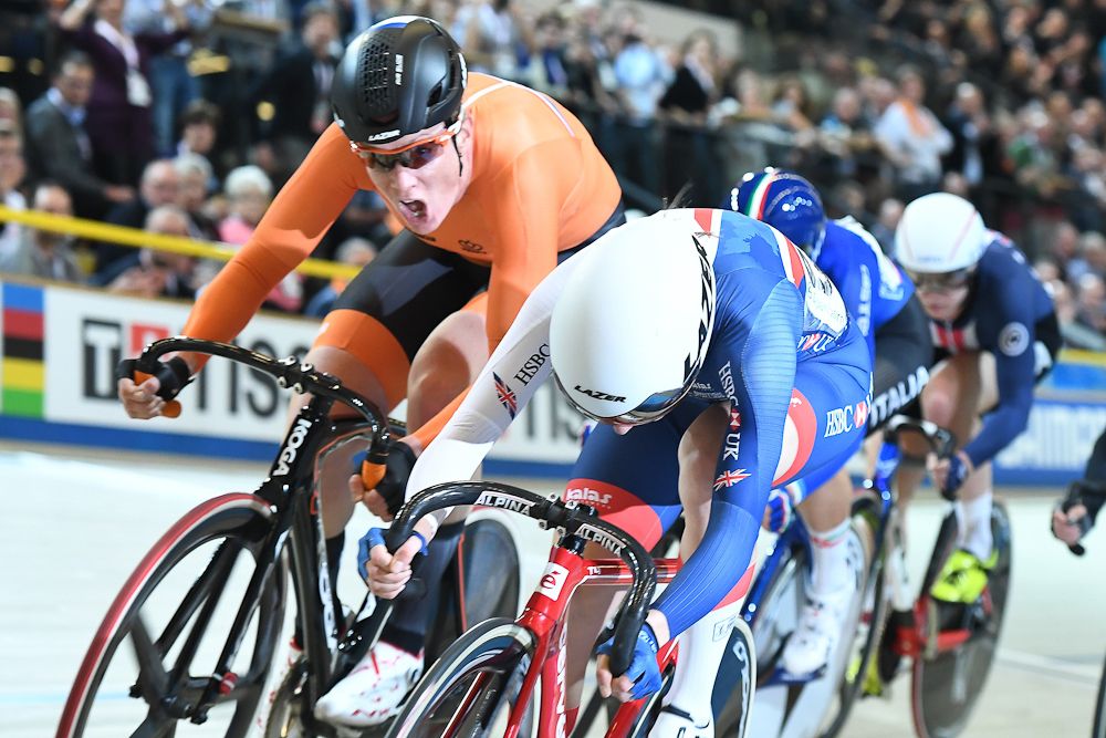 Gold medal winner Netherland's Kirsten Wild (L) competes during the women's omnium during the UCI Track Cycling World Championships