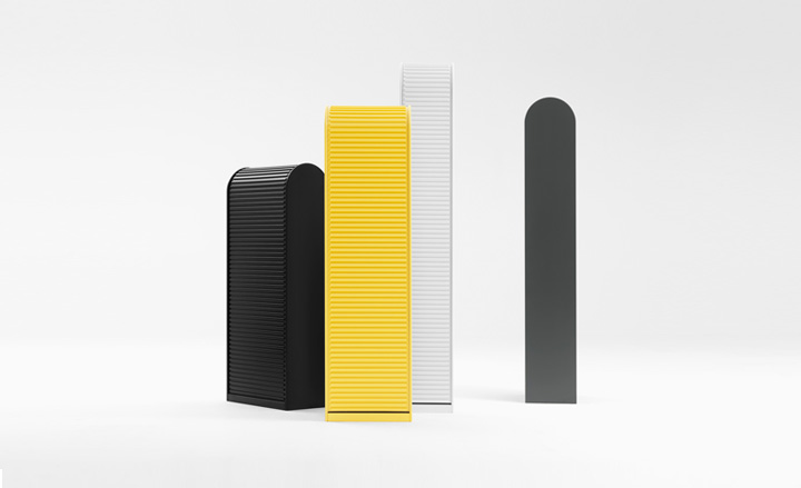 A black, yellow, white and grey tower structure.