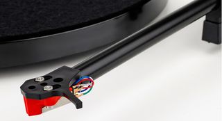 The standard Ortofon OMB5 cartridge has been replaced by Rega’s own Bias 2