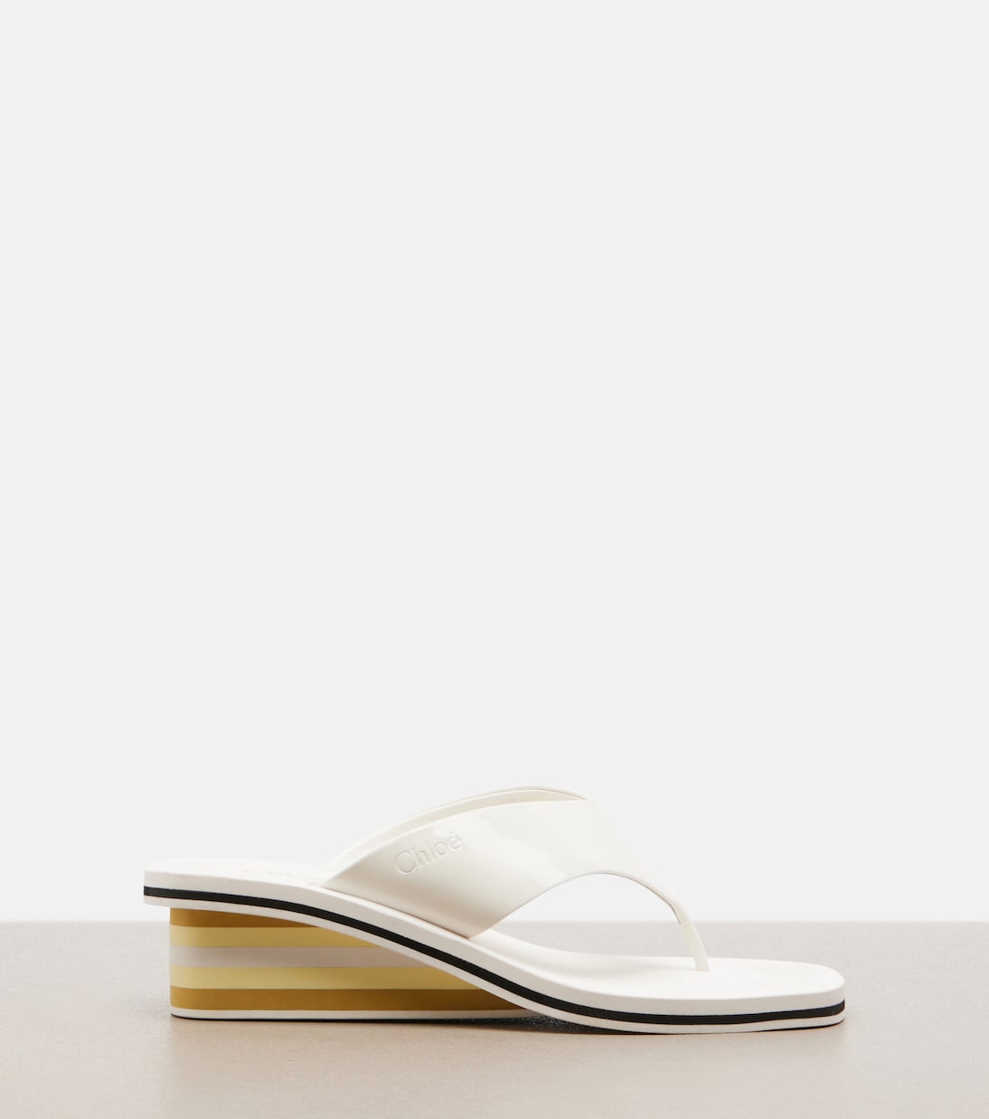 Swimming Cool Patent Leather Thong Sandals in White - Chloe