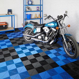 Interlocking floor tiles offer a budget-friendly solution