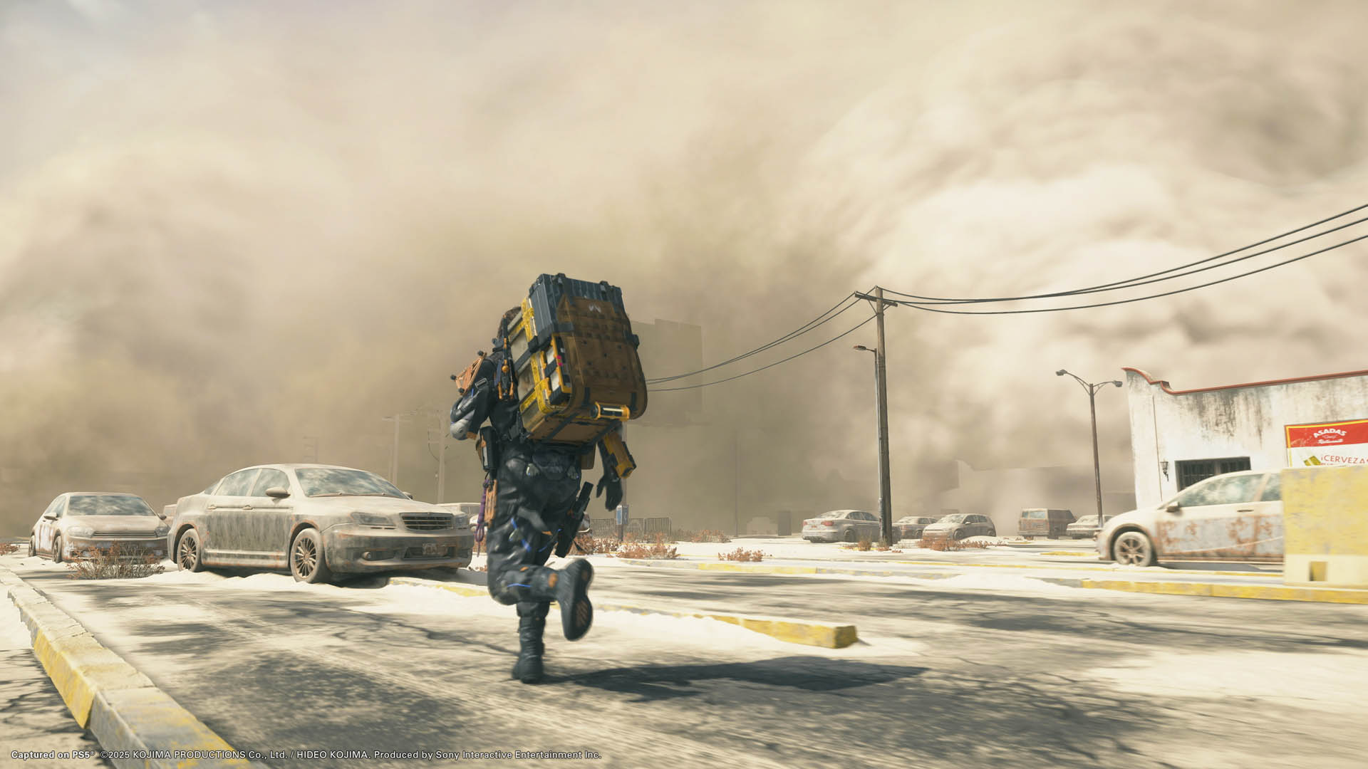 Sam Bridges jogs down a road towards a sandstorm in Death Stranding 2: On The Beach