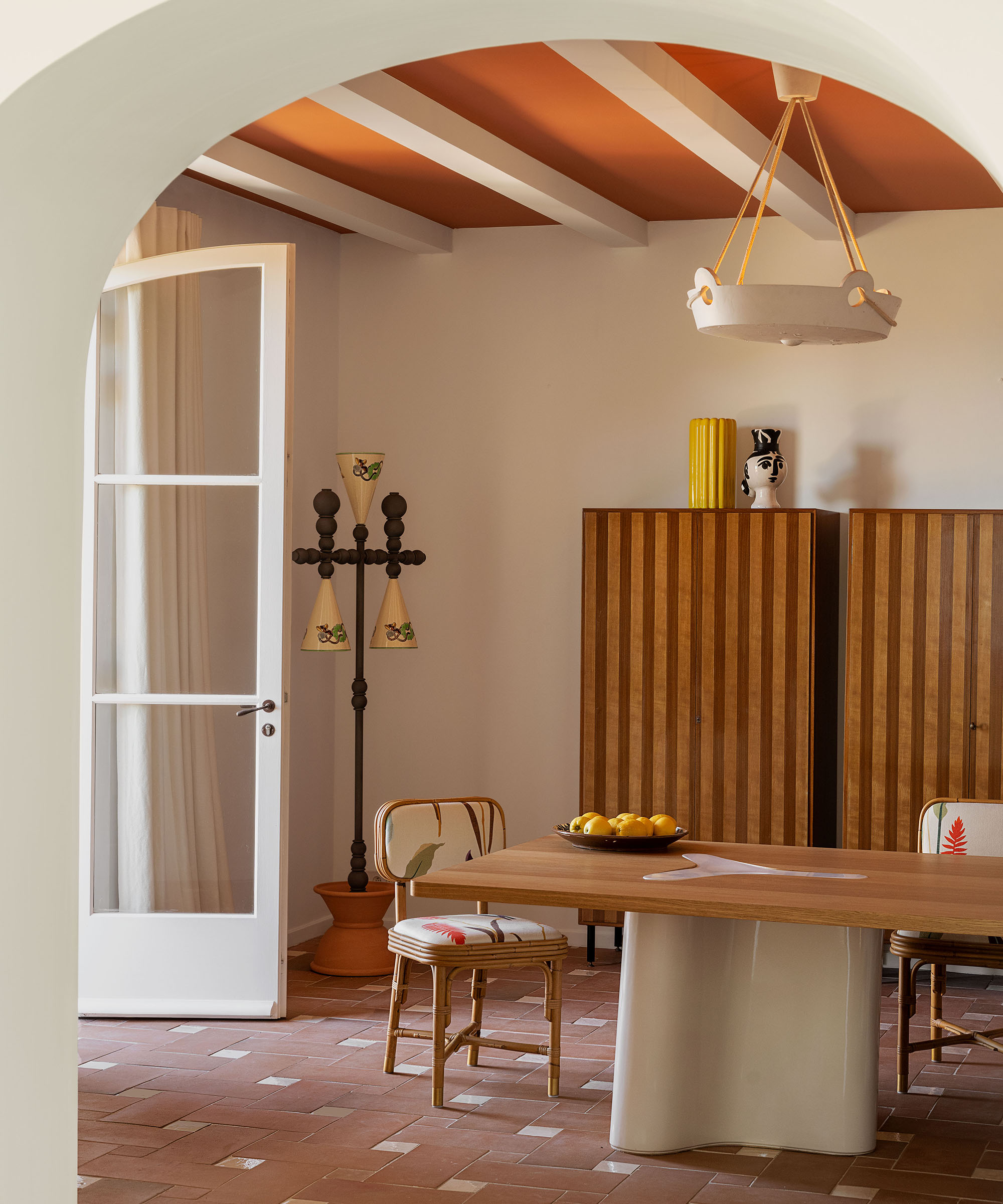 dining room with wood dining table and a chair at the end