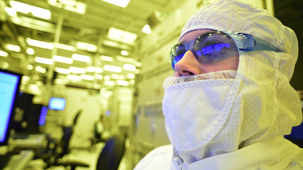 Intel employee in bunny suit working at fab plant 