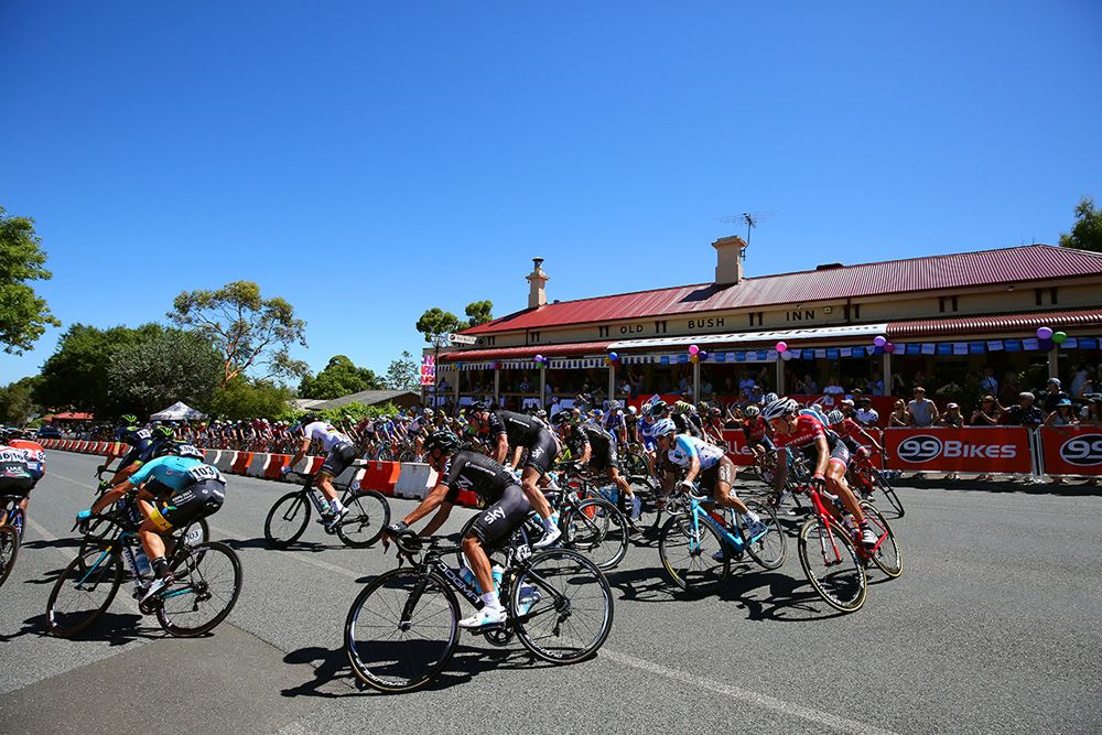 The riders take a tight turn