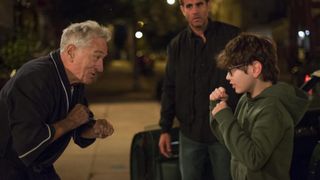 Robert De Niro and William Fitzgerald raise fists with Bobby Cannavale in the background in Ezra