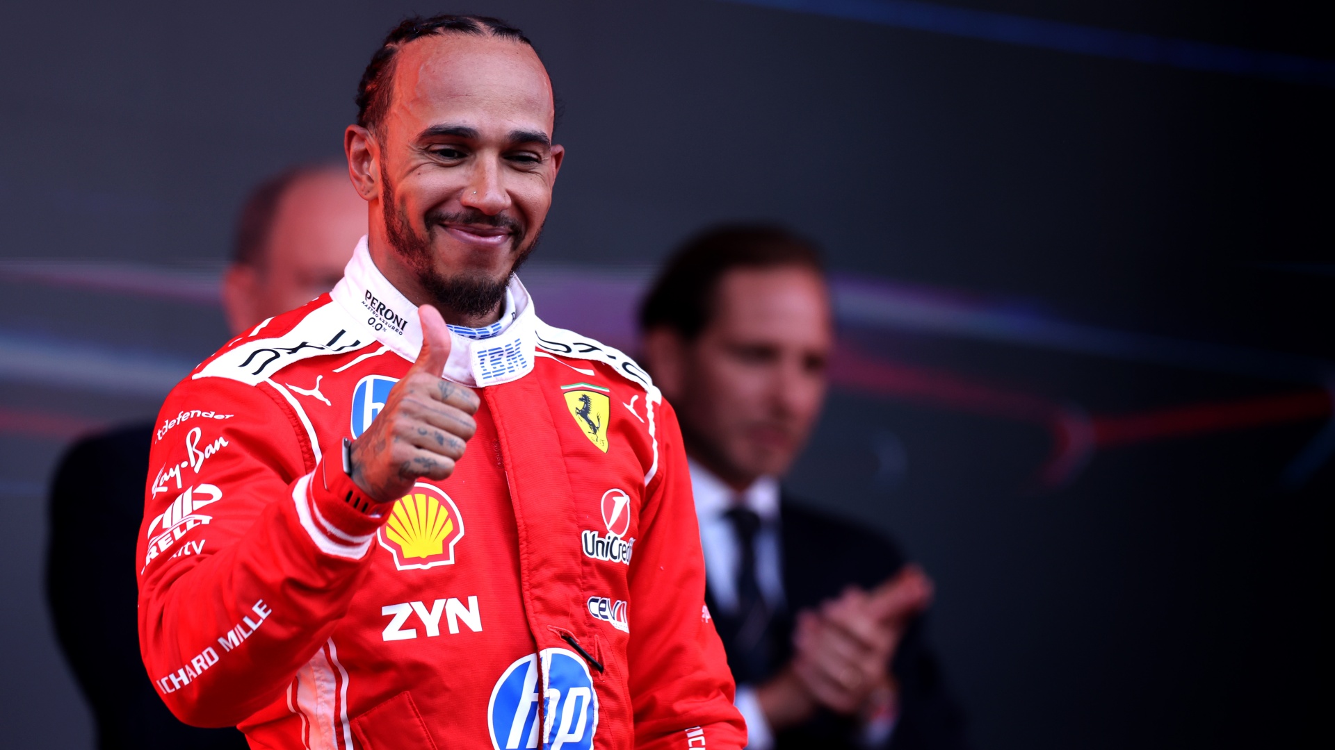 F1 driver Lewis Hamilton of Ferrari giving his thumbs up to fans