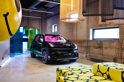 Lynk &amp; Co Offices, Gothenburg, by New Order Arkitektur, with car and smiley face furniture