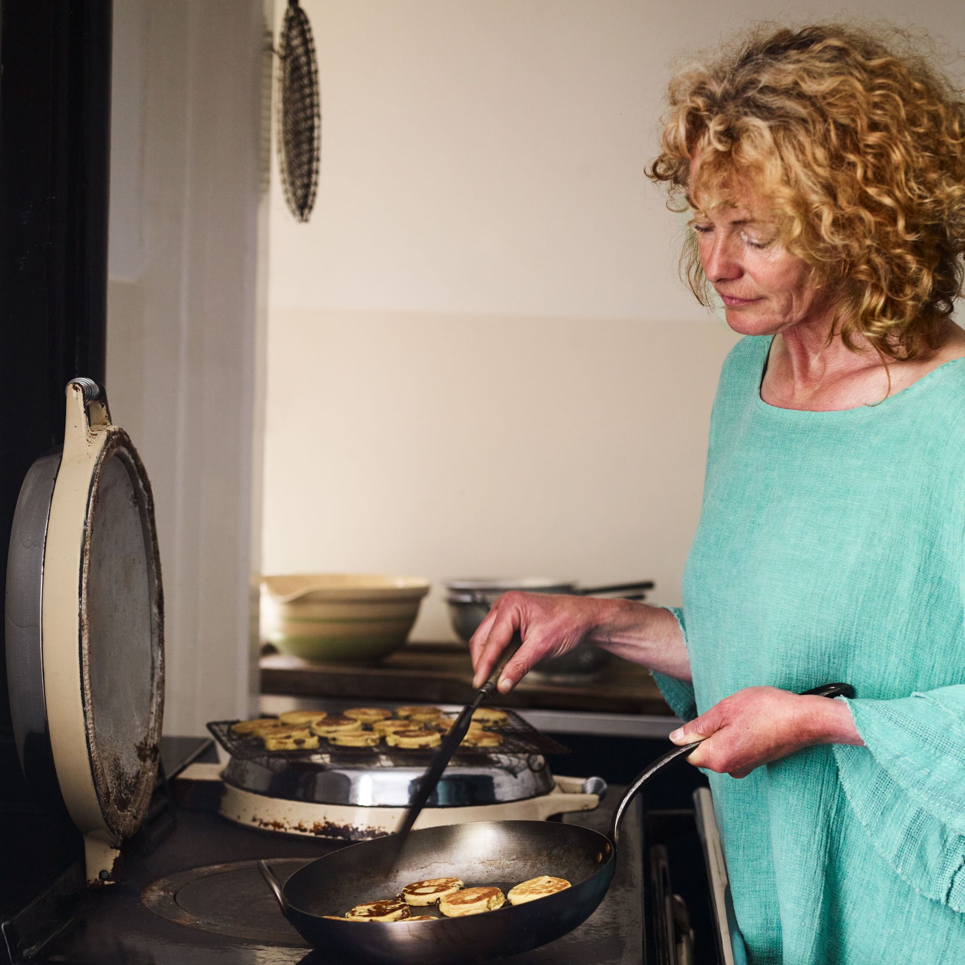 Kate Humble making drop scone pancakes on an Aga