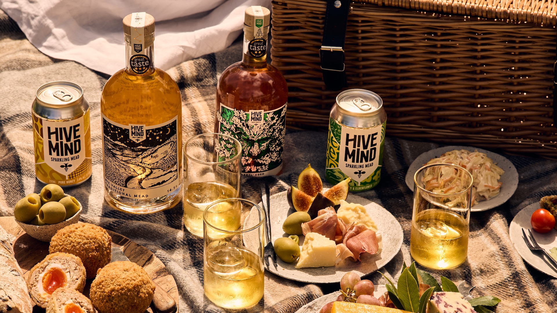 A selection of Hive Mind meads laid out for a picnic