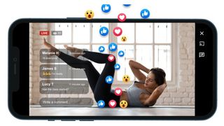 Woman in yoga pose on mobile phone screen, surrounded by emojis