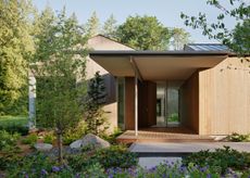 Interurban Residence, a Pacific Northwest retreat and a low timber home with minimalist style and light wood tones