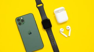 iPhone 13 Pro, Apple Watch, and AirPods shown against yellow background