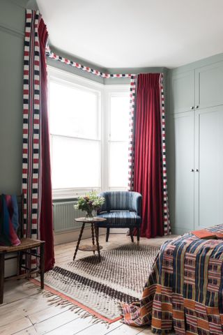 Curtains and pelmet in red, black and white check fabric