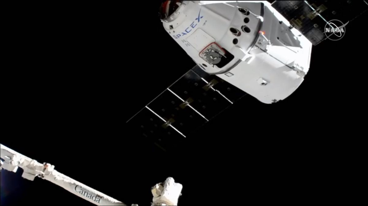 A previously flown Dragon cargo ship arrives at the International Space Station carrying 5,000 lbs. of supplies on the CRS-18 mission for NASA on July 27, 2019.