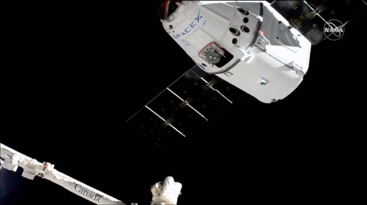 A previously flown Dragon cargo ship arrives at the International Space Station carrying 5,000 lbs. of supplies on the CRS-18 mission for NASA on July 27, 2019.