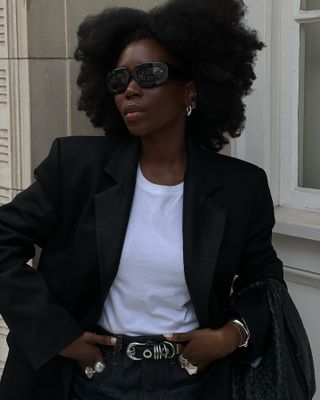 Danielle Jinadu wears her healthy type 4 curls in a full afro