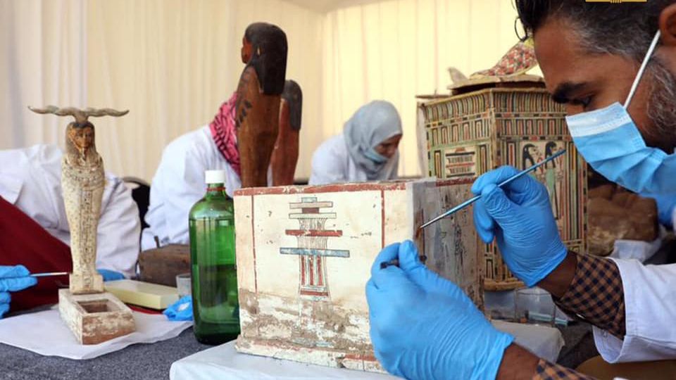 Some of the artifacts found with the mummy-filled coffins at Saqqara are in the process of being cleaned, conserved and analyzed.