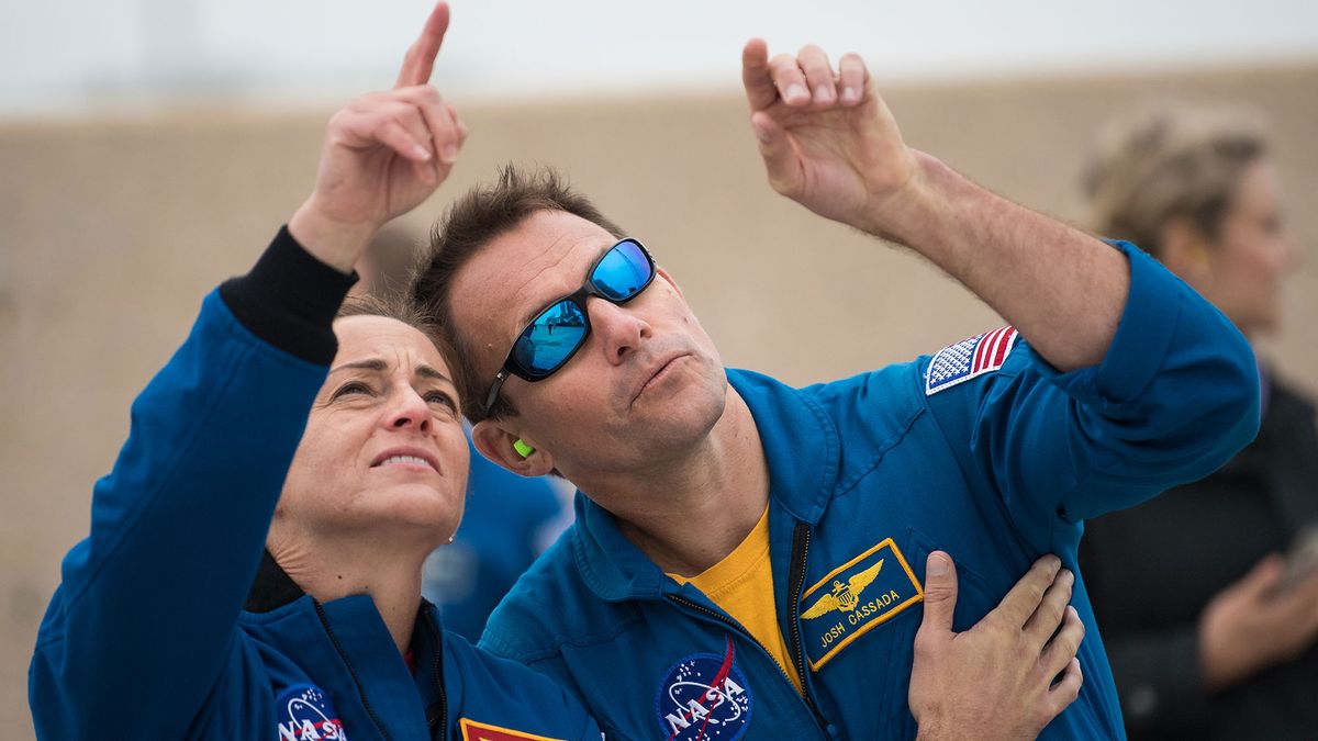 NASA astronauts Nicole Mann and Josh Cassada watch as a United Launch Alliance Atlas V rocket with Boeing&rsquo;s CST-100 Starliner spacecraft onboard is rolled to the launch pad at Space Launch Complex 41 ahead of the Orbital Flight Test mission, Wednesday, Dec. 18, 2019 at Cape Canaveral Air Force Station in Florida.