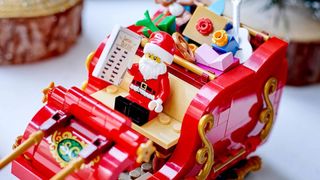 Lego Santa's Sleigh closeup with mini figure sitting in seat