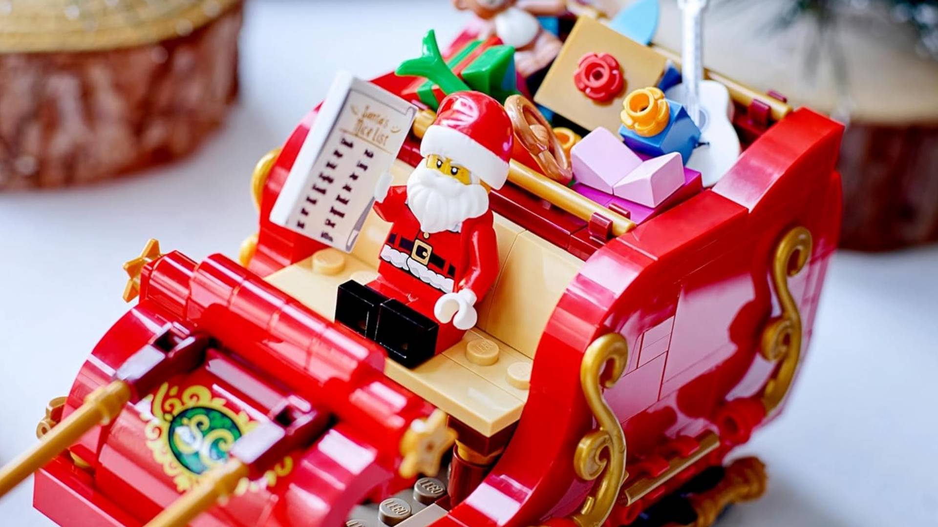 Lego Santa's Sleigh closeup with mini figure sitting in seat