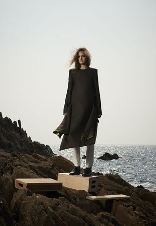 Schubert's tactile, sculptural shapes boldly combined traditional and techno fabrics like tweed and Neoprene