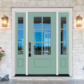 Mint green front door with white porch