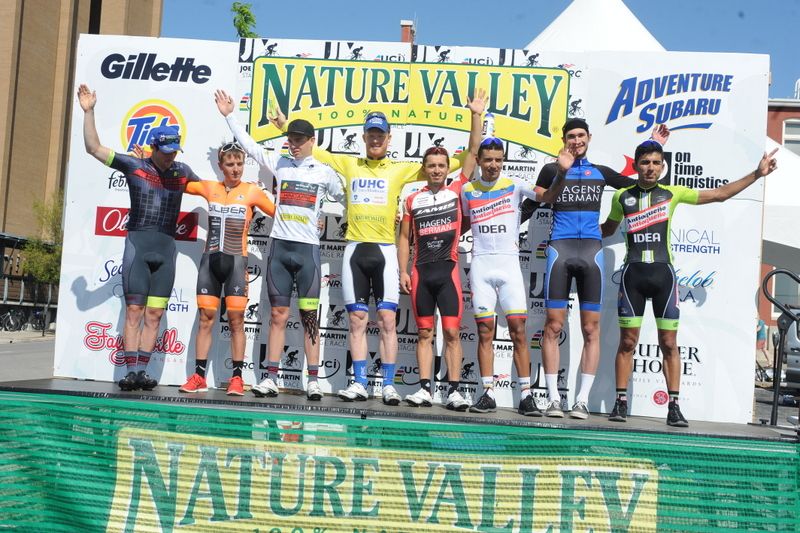 The podium and final jersey winners on the stage