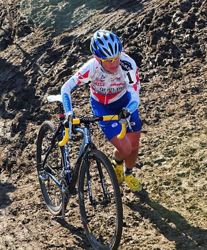 Katerina Nash (Luna Pro Team) leading the race on a steep run-up.