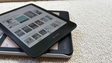 A kindle on top of a kobo