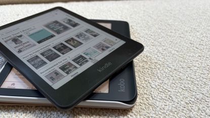 A kindle on top of a kobo