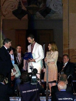 Andrea Tafi accepts one of his many awards