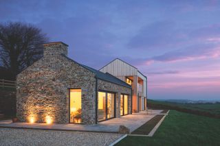 stone and timber cladding on exterior of self build