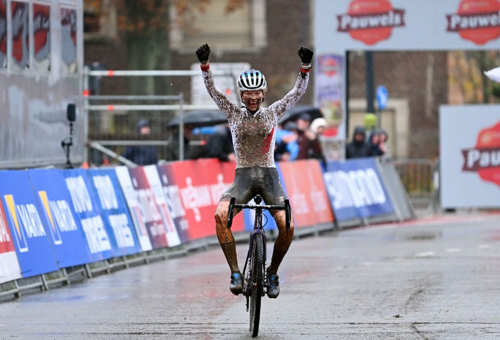 OVERIJSE BELGIUM NOVEMBER 20 Puck Pieterse of The Netherlands and Team Alpecin Deceuninck celebrates at finish line as race winner during the 62nd UCI Cyclocross World Cup Druivencross Overijse 2022 Womens Elite CXWorldCup Overijse Cyclocross on November 20 2022 in Overijse Belgium Photo by Luc ClaessenGetty Images