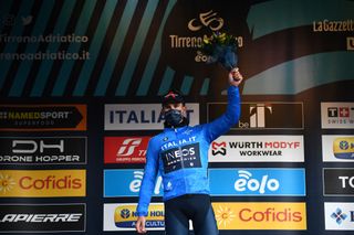 TERNI ITALY MARCH 09 Filippo Ganna of Italy and Team INEOS Grenadiers Blue Leader Jersey celebrates at podium winner during the 57th TirrenoAdriatico 2022 Stage 3 a 170km stage from Murlo to Terni TirrenoAdriatico WorldTour on March 09 2022 in Terni Italy Photo by Tim de WaeleGetty Images