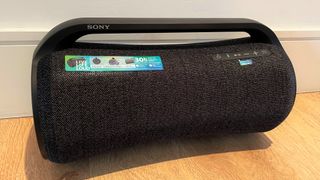 Sony SRS-XG500 review: speaker on wooden floor