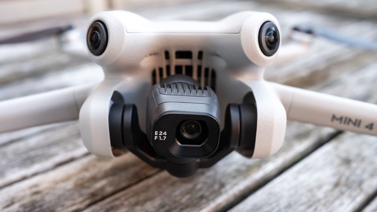 close-up of the black camera mounded to the forward bottom of a drone.