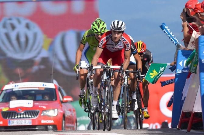 With one-eye on the clock, Dani Moreno (Katusha) crosses the line