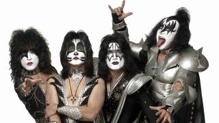 Kiss posing for a photograph in 2009