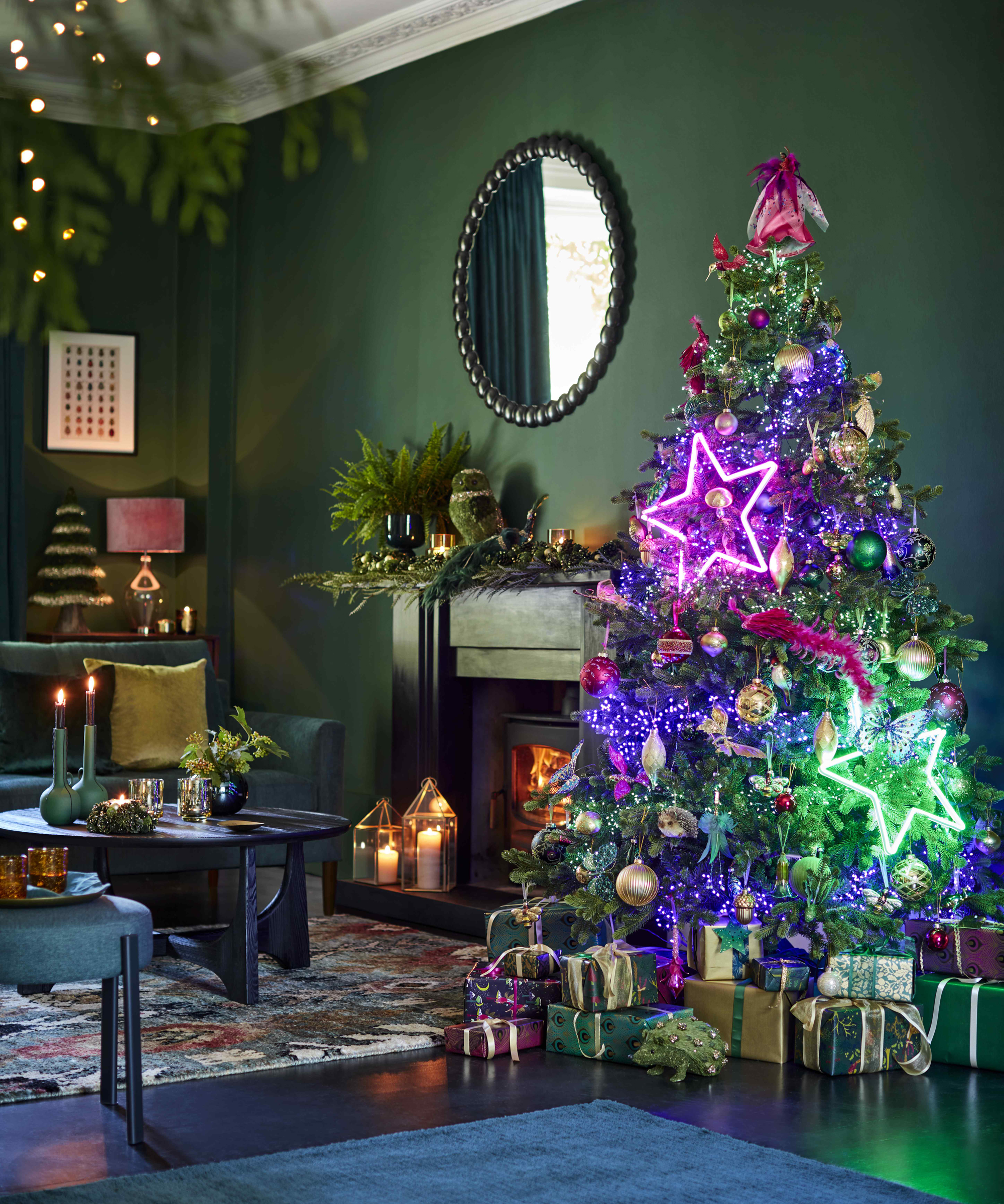 Christmas tree themes 2021 with multicolored baubles and neon lights