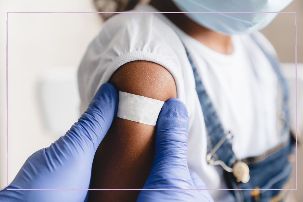 child getting injection, plaster stuck over arm after