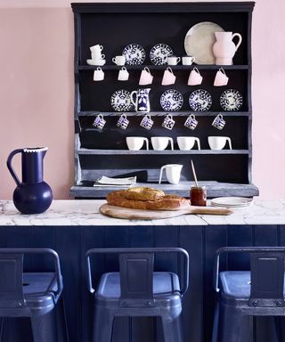 Annie Sloan traditional kitchen idea with bar stools