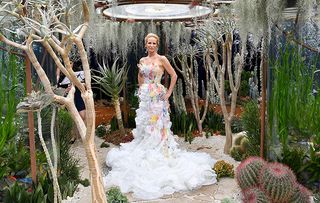 LONDON, ENGLAND - MAY 21: World-Champion Free-diver Tanya Streeter poses at The Pearlfisher Garden while wearing a dress designed by BA Fashion and Textiles students from The University of Brighton during the Chelsea Flower Show 2018 on May 21, 2018 in London, England. (Photo by Jeff Spicer/Getty Images)