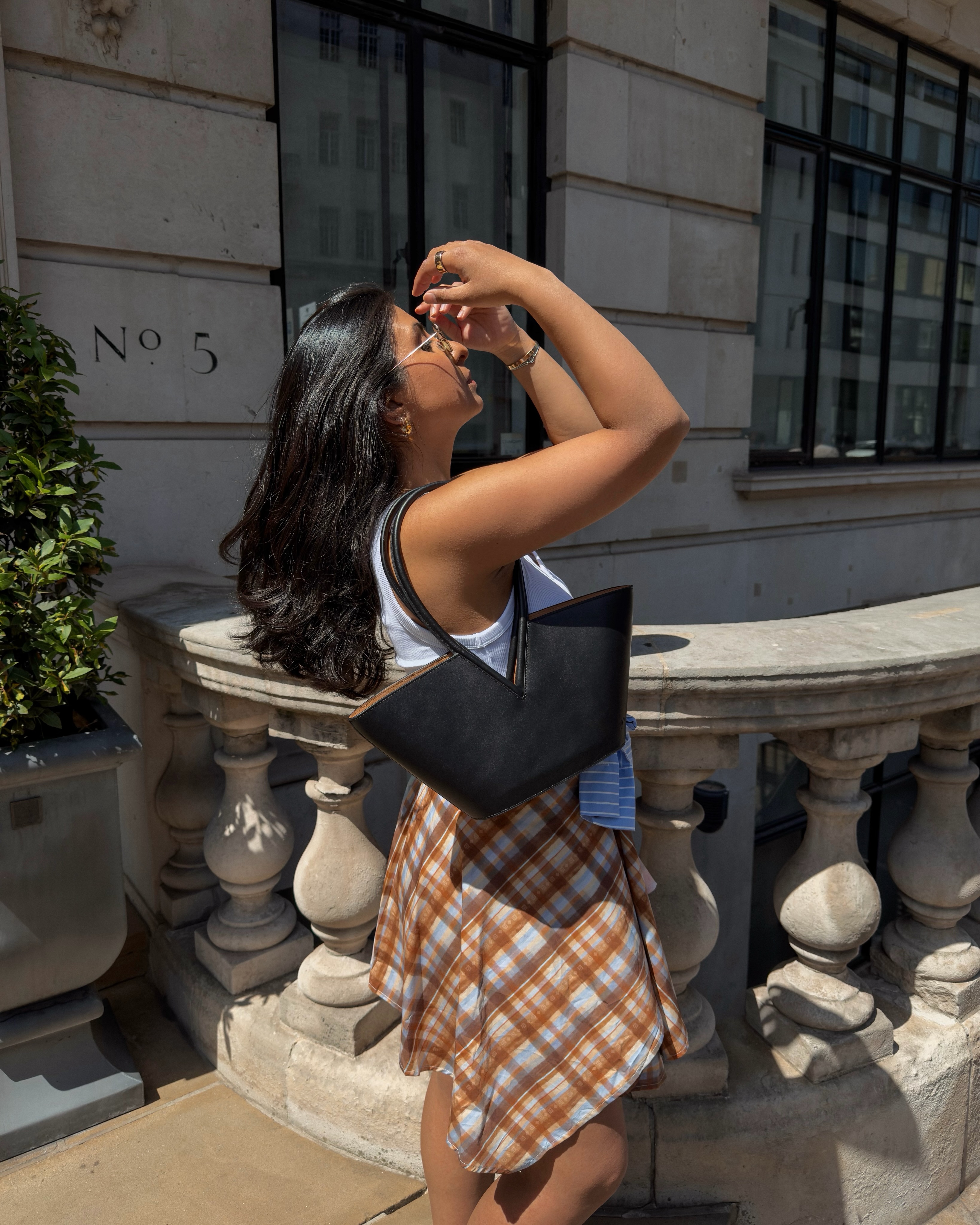 Everyone In NYC Is Wearing This Once-Dated Skirt Trend With Simple Summer Outfits Right Now