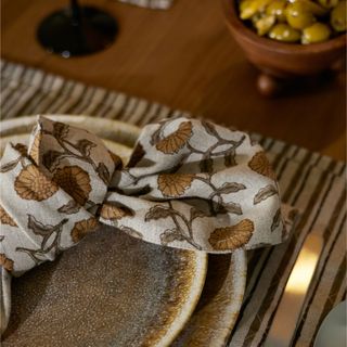 A patterned napkin on a set dining table from Lulu and Georgia