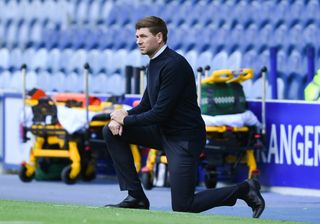 Rangers manager Steven Gerrard takes a knee ahead of the match against St MIrren