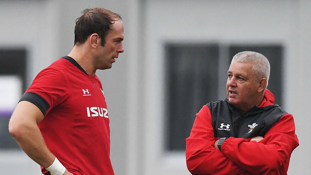 Wales captain Alun Wyn Jones speaks with head coach Warren Gatland