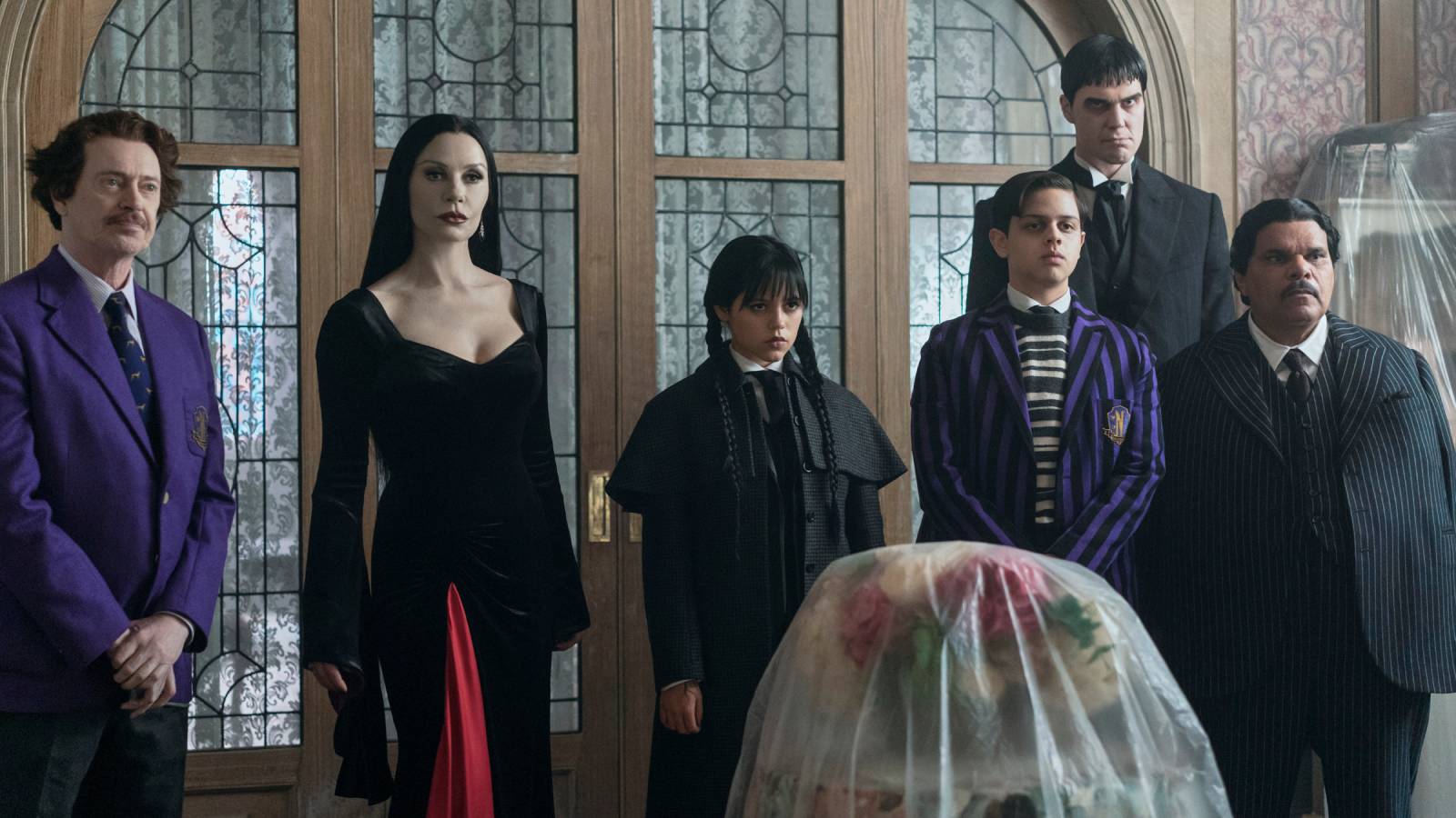 Steve Buscemi, Catherine Zeta-Jones, Jenna Ortega, Isaac Ordonez as Pugsley Addams, Joonas Suotamo and Luis Guzmán in Wednesday season 2 on Netflix.