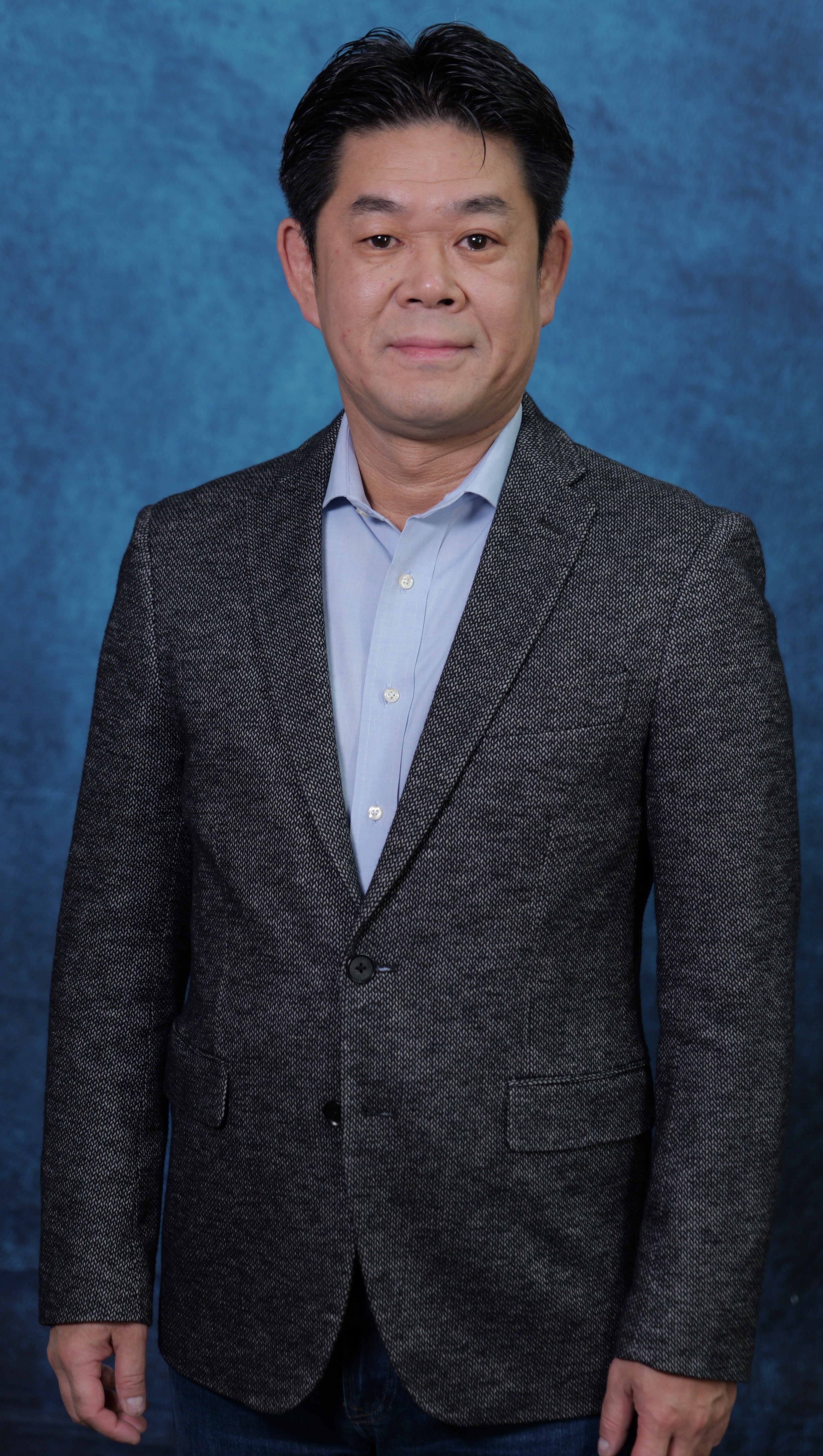 Headshot of Panasonic CEO.