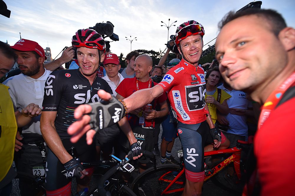 Teammates congratulate Chris Froome after the final Vuelta stage in Madrid